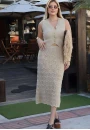 Saia de Tricot Midi Feminina com Textura Moderna e Caimento Elegante - Bege Saia de Tricot Midi Feminina com Textura Moderna e Caimento Elegante - Bege